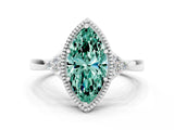 White gold Marquise Cut Green Sapphire Halo Ring with Tapered Band and Four-Prong Setting