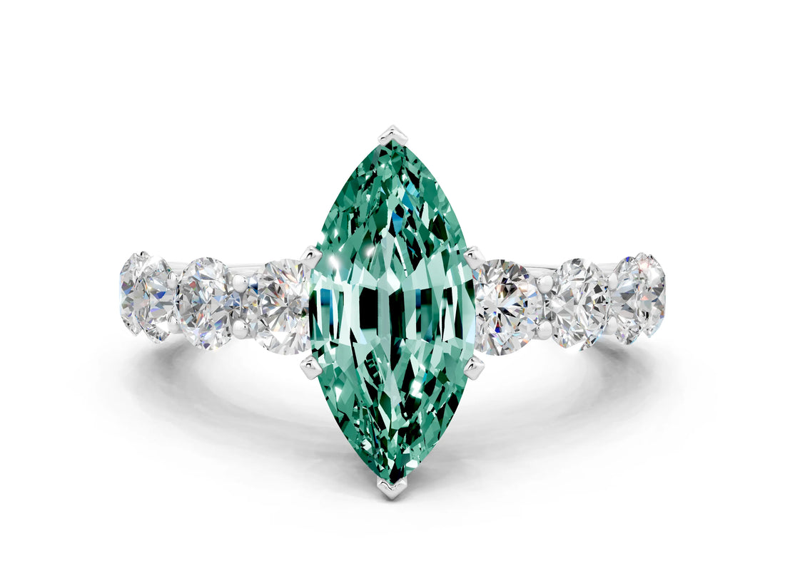 White gold Marquise Cut Green Sapphire Prong Setting with Side Stones on a Pave Band
