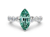 White gold Marquise Cut Green Sapphire Prong Setting with Side Stones on a Pave Band