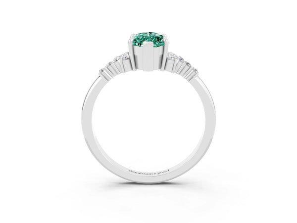 White gold Marquise Cut Green Sapphire Ring with Side Stones and Four-Prong Setting