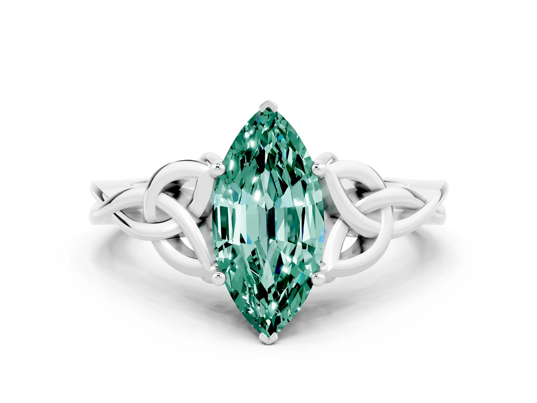 White gold Marquise Cut Green Sapphire Solitaire Engagement Ring with Celtic Knot Band and Four-Prong Setting