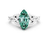 White gold Marquise Cut Green Sapphire Solitaire Engagement Ring with Celtic Knot Band and Four-Prong Setting