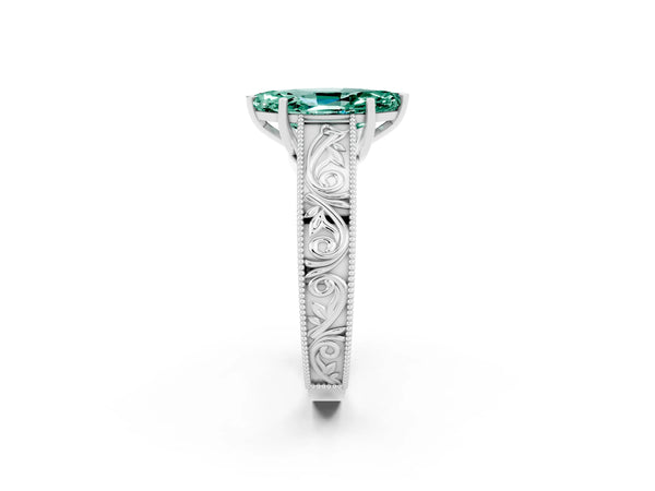 White gold Marquise Cut Green Sapphire Solitaire Ring with Engraved Band and Four-Prong Setting