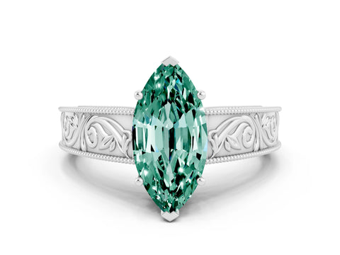 White gold Marquise Cut Green Sapphire Solitaire Ring with Engraved Band and Four-Prong Setting