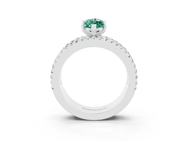 Platinum Marquise Cut Green Sapphire Solitaire Ring with Pavé and Channel Set Band