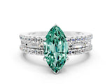 White gold Marquise Cut Green Sapphire Solitaire Ring with Pavé and Channel Set Band