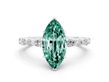 White gold Marquise Cut Green Sapphire Solitaire with Side Stones on a Pavé Band and Four-Prong Setting