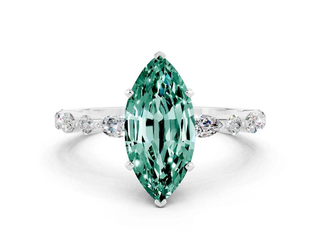 White gold Marquise Cut Green Sapphire Solitaire with Side Stones on a Pavé Band and Four-Prong Setting
