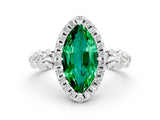 White gold Marquise Cut Halo Diamond Solitaire with Filigree Band and Four-Prong Setting
