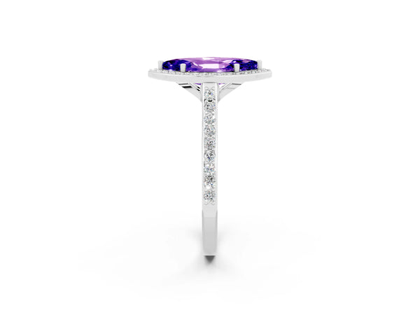 White gold Marquise Cut Tanzanite Halo Engagement Ring with Round Pavé Shoulders and Prong Setting