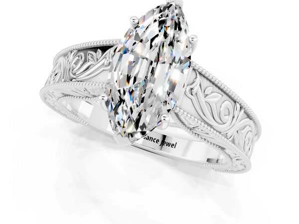 Platinum Marquise Cut Moissanite Solitaire Ring with Engraved Band and Four-Prong Setting