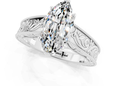 White gold Marquise Cut Moissanite Solitaire Ring with Engraved Band and Four-Prong Setting_1