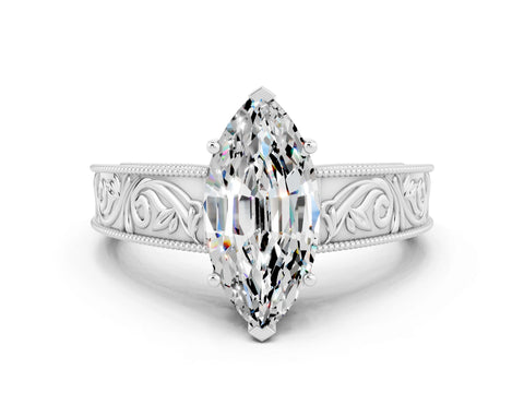 White gold Marquise Cut Moissanite Solitaire Ring with Engraved Band and Four-Prong Setting