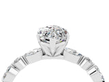 White gold Marquise Cut Moissanite Solitaire with Side Stones on a Pavé Band and Four-Prong Setting_4
