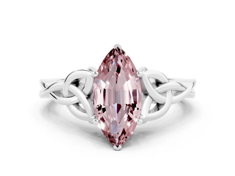 White gold Marquise Cut Morganite Solitaire Engagement Ring with Celtic Knot Band and Four-Prong Setting