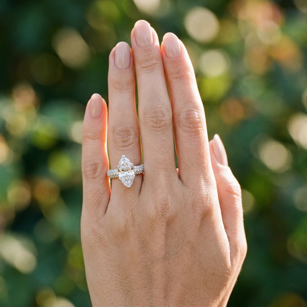 White gold Marquise Cut Pave Diamond Engagement Ring with Channel Set Band and Four-Prong Setting