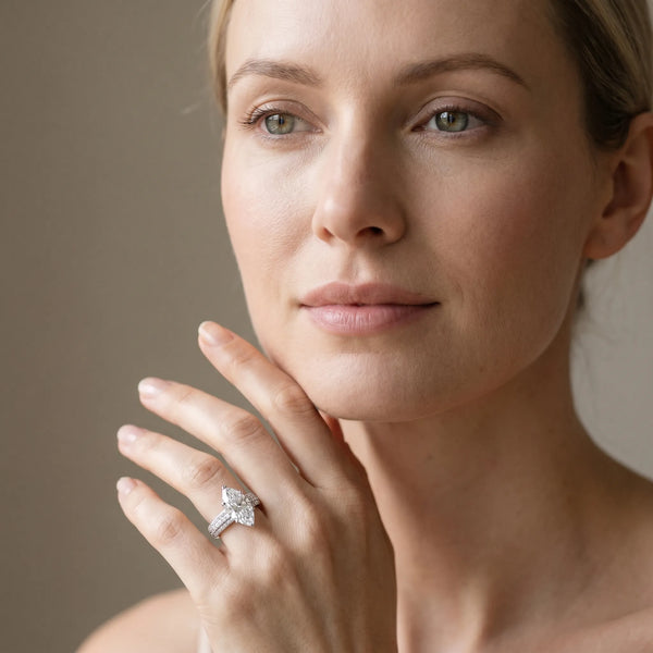 White gold Marquise Cut Pave Diamond Engagement Ring with Channel Set Band and Four-Prong Setting