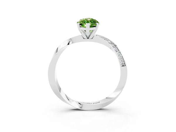 Silver Marquise Cut Peridot Engagement Ring with Side Stone Accents and Four-Prong Setting