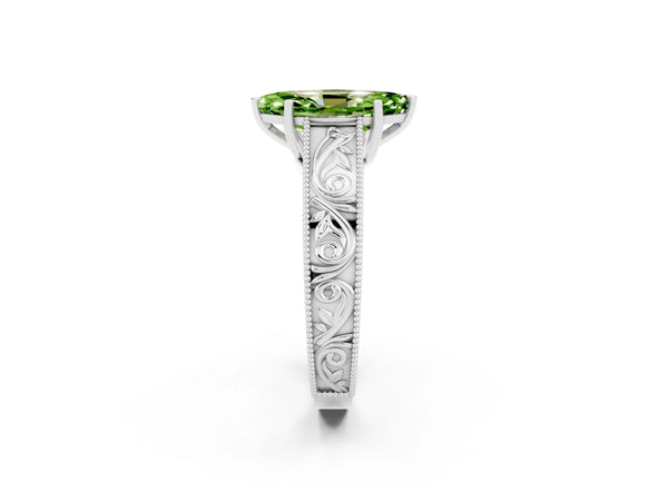 Silver Marquise Cut Peridot Solitaire Ring with Engraved Band and Four-Prong Setting