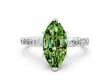 White gold Marquise Cut Peridot Solitaire with Side Baguettes and Channel Set Band