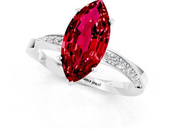 White gold Marquise Cut Ruby Engagement Ring with Side Stone Accents and Four-Prong Setting