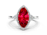 White gold Marquise Cut Ruby Halo Ring with Tapered Band and Four-Prong Setting