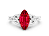 White gold Marquise Cut Ruby Solitaire Engagement Ring with Celtic Knot Band and Four-Prong Setting
