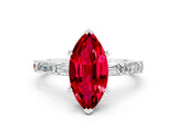 White gold Marquise Cut Ruby Solitaire with Side Baguettes and Channel Set Band