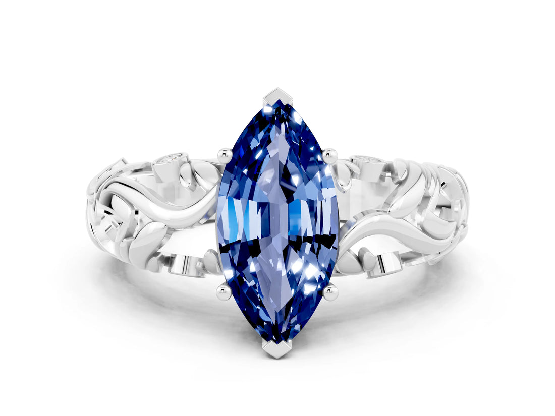 White gold Marquise Cut Solitaire Blue Sapphire Leaf-Inspired Vine Band Ring with Prong Setting