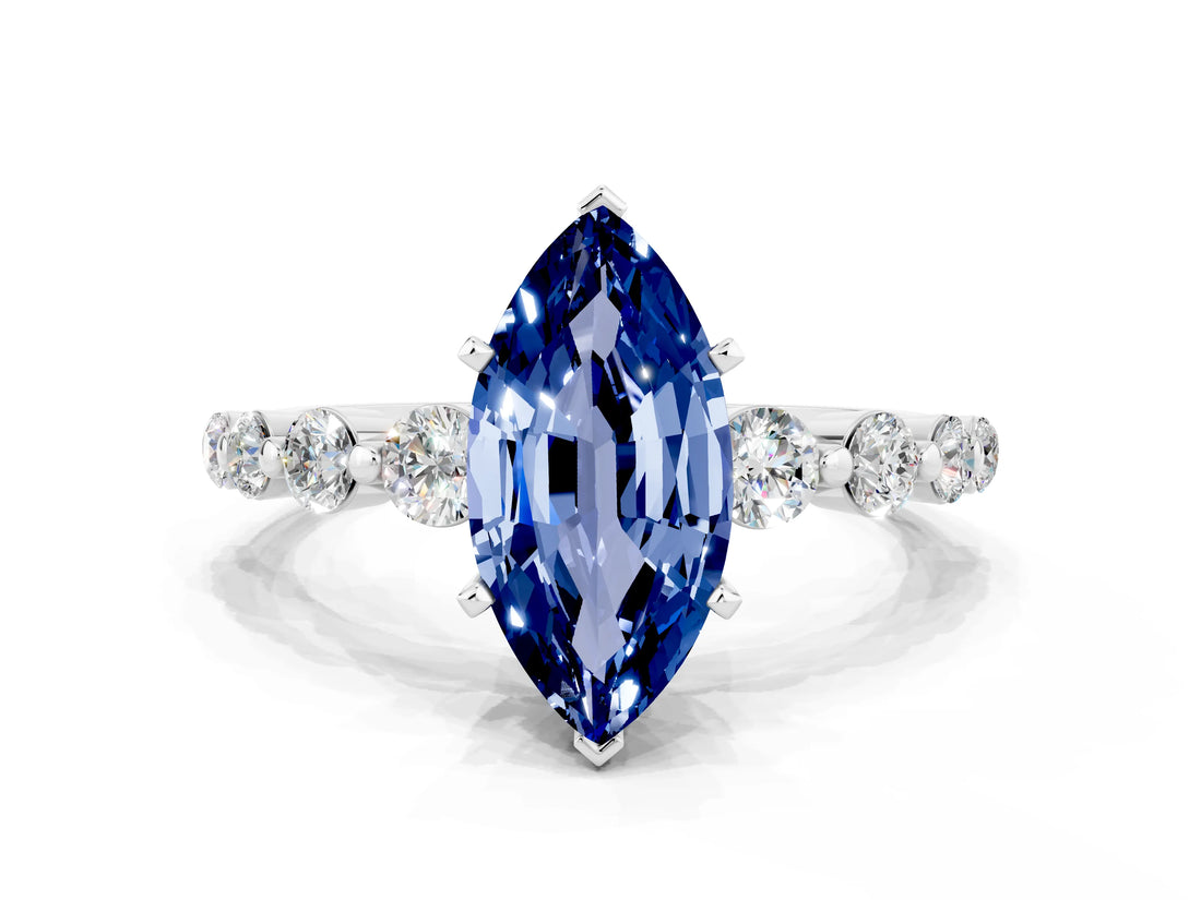 White gold Marquise Cut Solitaire Blue Sapphire Ring with Pave Band and Four-Prong Setting