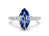 White gold Marquise Cut Solitaire Blue Sapphire Ring with Pave Band and Four-Prong Setting