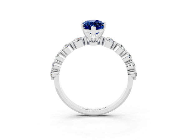White gold Marquise Cut Solitaire Blue Sapphire Ring with Pave Band and Four-Prong Setting