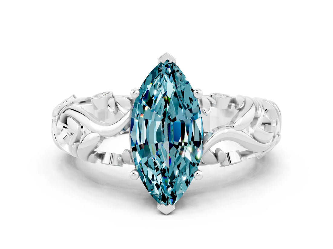 White gold Marquise Cut Solitaire Blue Topaz Leaf-Inspired Vine Band Ring with Prong Setting