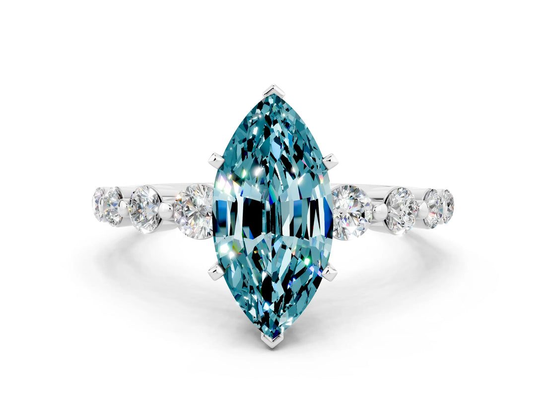 White gold Marquise Cut Solitaire Blue Topaz Ring with Pave Band and Four-Prong Setting