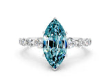 White gold Marquise Cut Solitaire Blue Topaz Ring with Pave Band and Four-Prong Setting