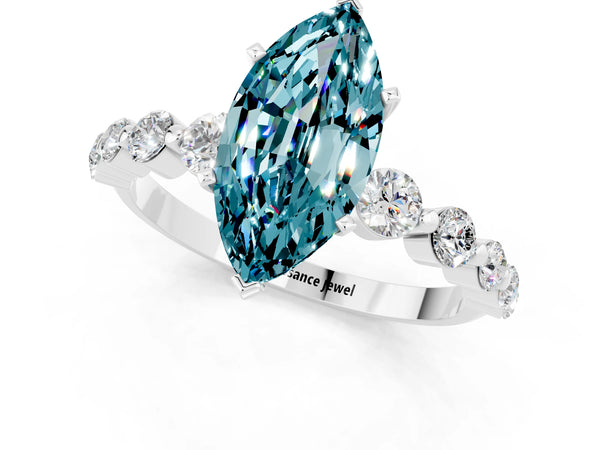 Silver Marquise Cut Solitaire Blue Topaz Ring with Pave Band and Four-Prong Setting
