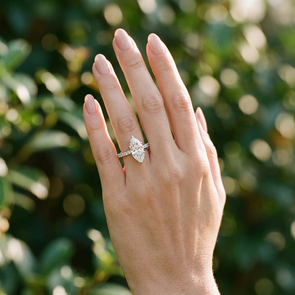 White gold Marquise Cut Solitaire Diamond Engagement Ring with Pave Band and Four-Prong Setting