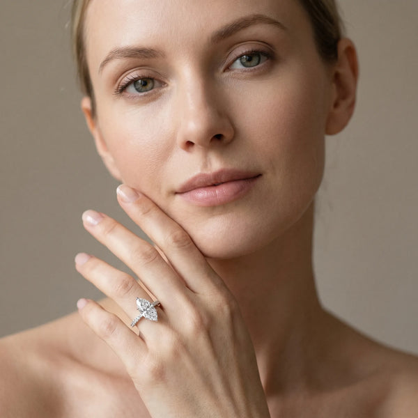 White gold Marquise Cut Solitaire Diamond Engagement Ring with Pave Band and Four-Prong Setting