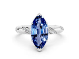 White gold Marquise Cut Solitaire Diamond Engagement Ring with Twisted Pave Band and Four-Prong Setting