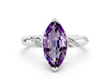 White gold Marquise Cut Solitaire Diamond Engagement Ring with Twisted Pave Band and Four-Prong Setting