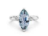 White gold Marquise Cut Solitaire Diamond Engagement Ring with Twisted Pave Band and Four-Prong Setting