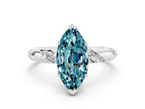 White gold Marquise Cut Solitaire Diamond Engagement Ring with Twisted Pave Band and Four-Prong Setting