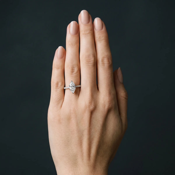 White gold Marquise Cut Solitaire Diamond Ring with Pave Band and Four-Prong Setting