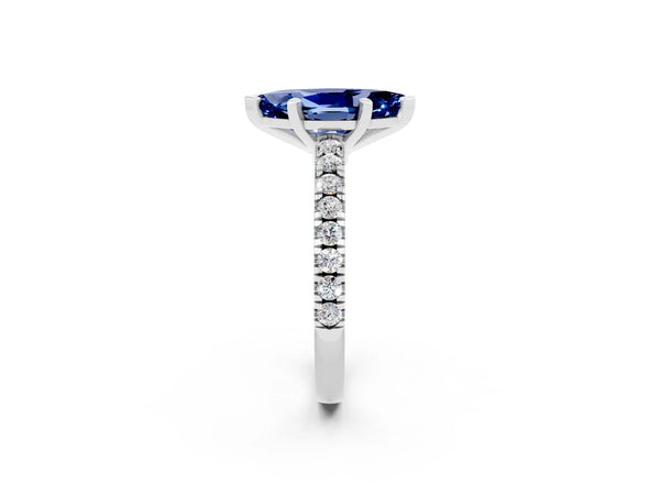 White gold Marquise Cut Solitaire Blue Sapphire with Pavé Band and Four-Prong Setting