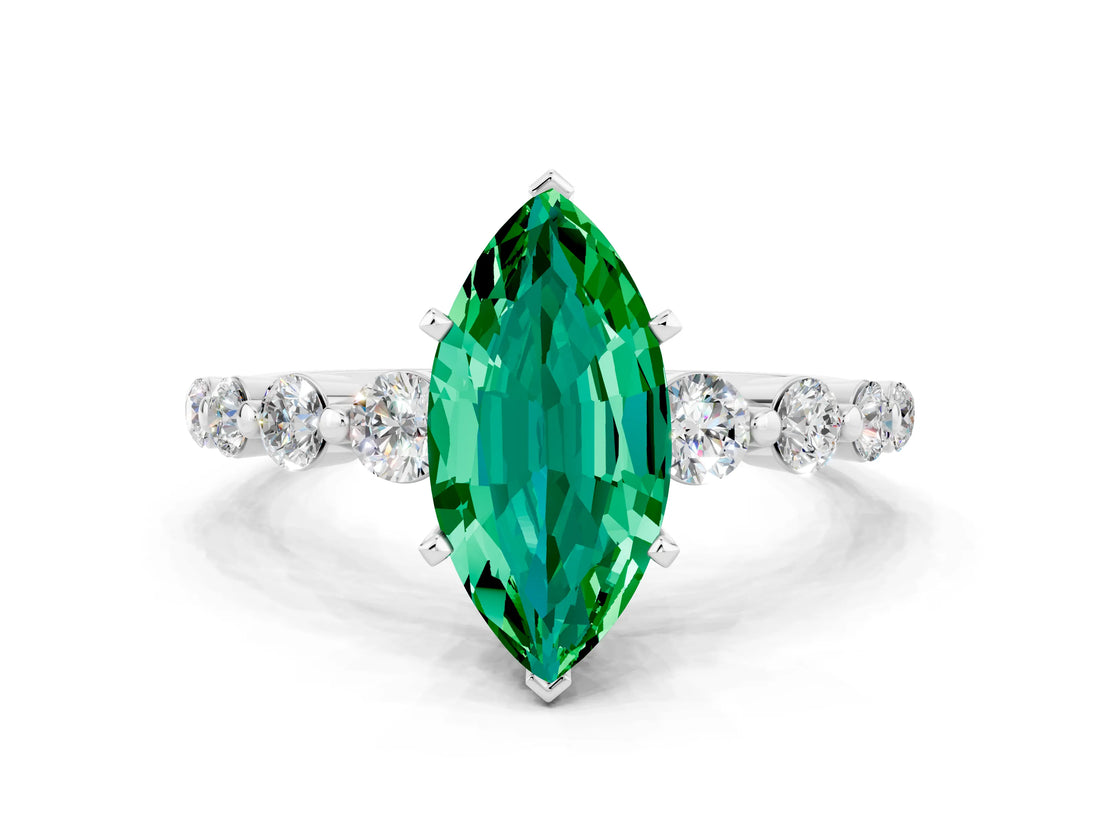 White gold Marquise Cut Solitaire Emerald Ring with Pave Band and Four-Prong Setting