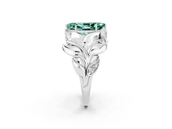 Platinum Marquise Cut Green Sapphire Leaf-Inspired Engagement Ring with Round Accents and Prong Setting