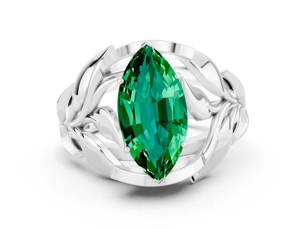Silver Marquise Cut Emerald Leaf-Inspired Engagement Ring with Round Accents and Prong Setting
