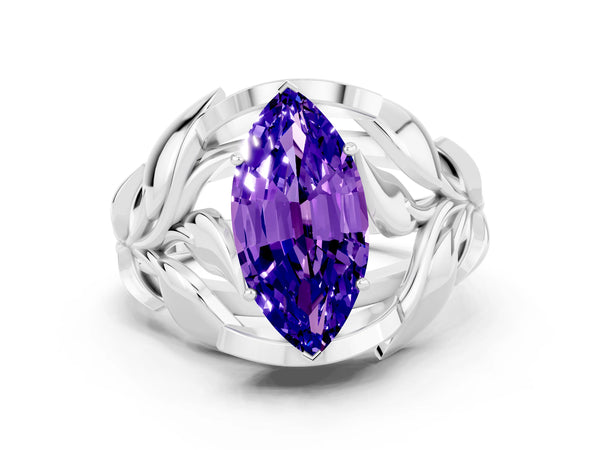 Silver Marquise Cut Tanzanite Leaf-Inspired Engagement Ring with Round Accents and Prong Setting