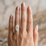 White gold Marquise Cut Solitaire Ring with Cathedral Band and Four-Prong Setting_131