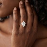 White gold Marquise Cut Solitaire Ring with Cathedral Band and Four-Prong Setting_133